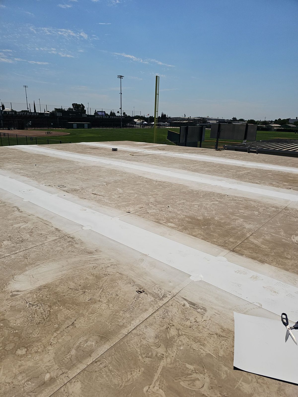 Buffalo Territory signage on Manteca High School sports facility with finished TPO roof