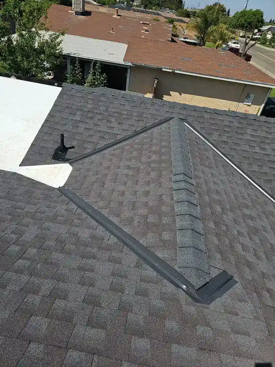 Livingston home after a full tear-off and re-roof — finished new shingle roof
