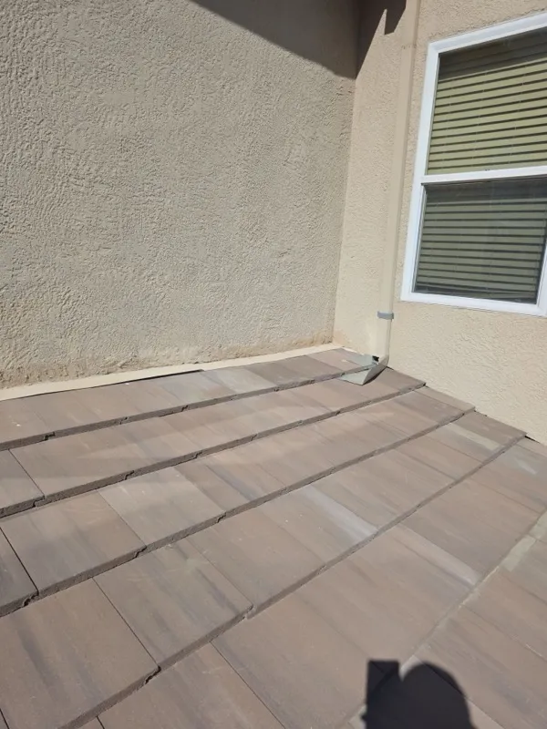 Livingston tile roof after leak repair — repaired, watertight tile section